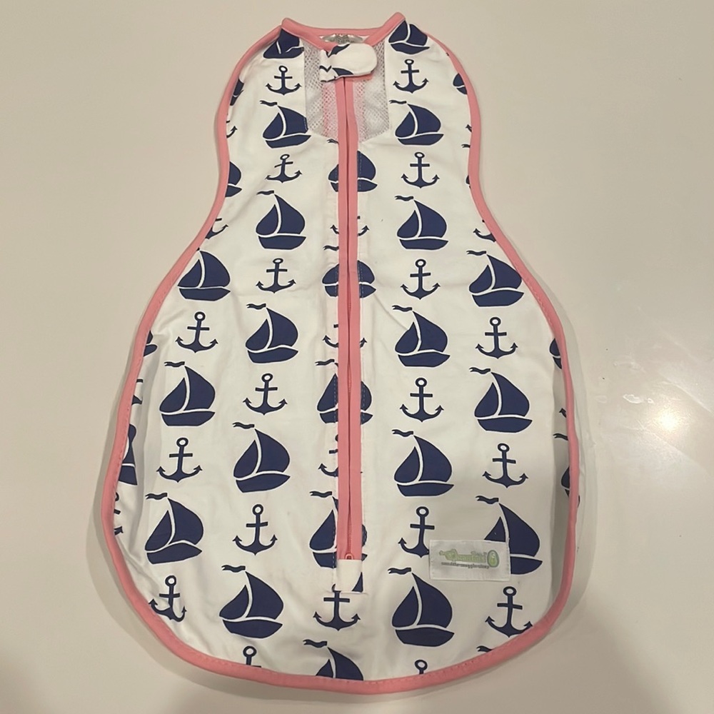 Woombie Air Swaddle. Never used. 0-3 months/5-13lbs